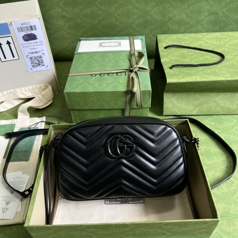 G*u*i satchel bags